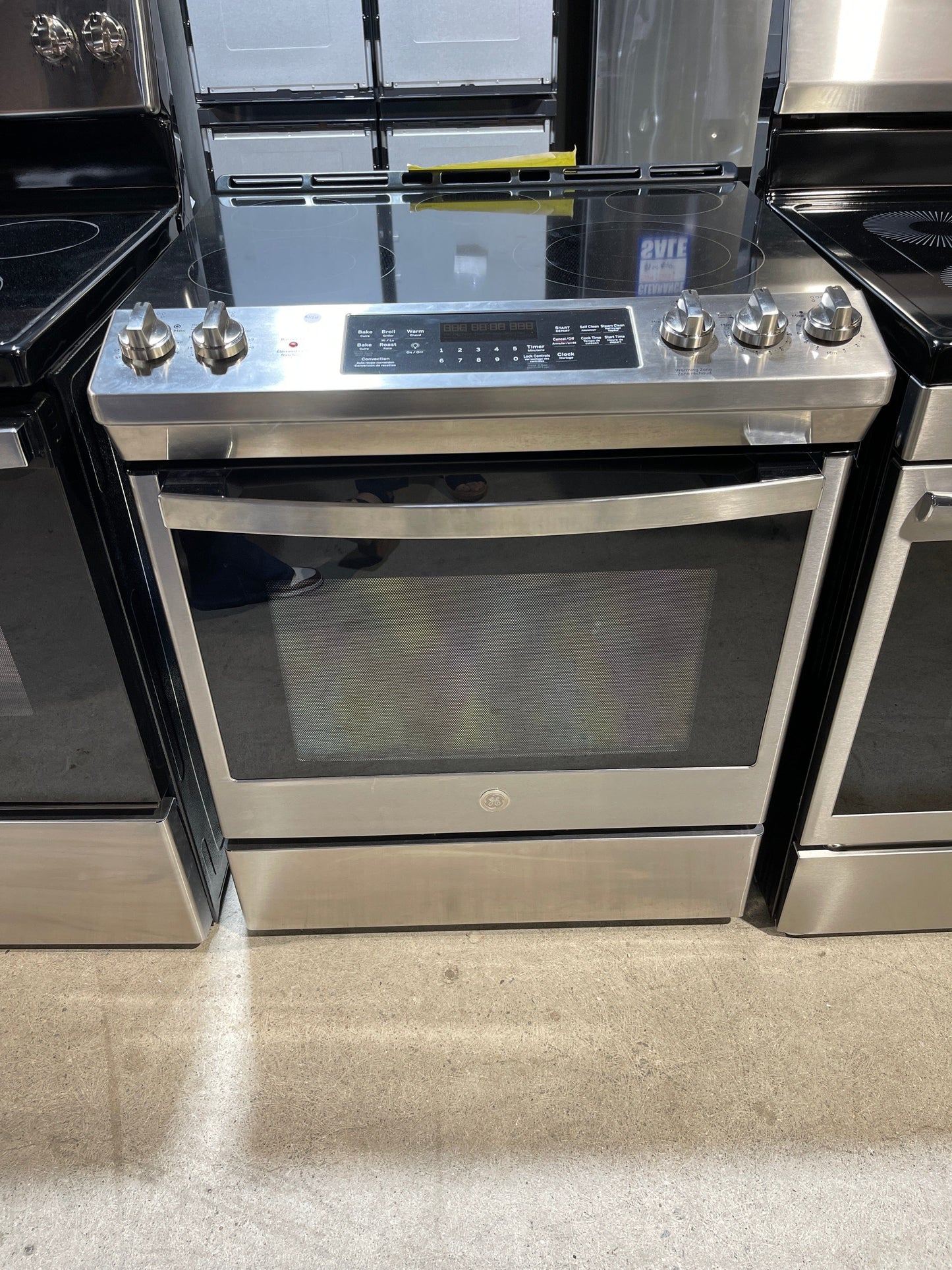 GE 30" Electric Slide-In Front Control True Convection Range with Storage Drawer Stainless Steel - JCS840SMSS
