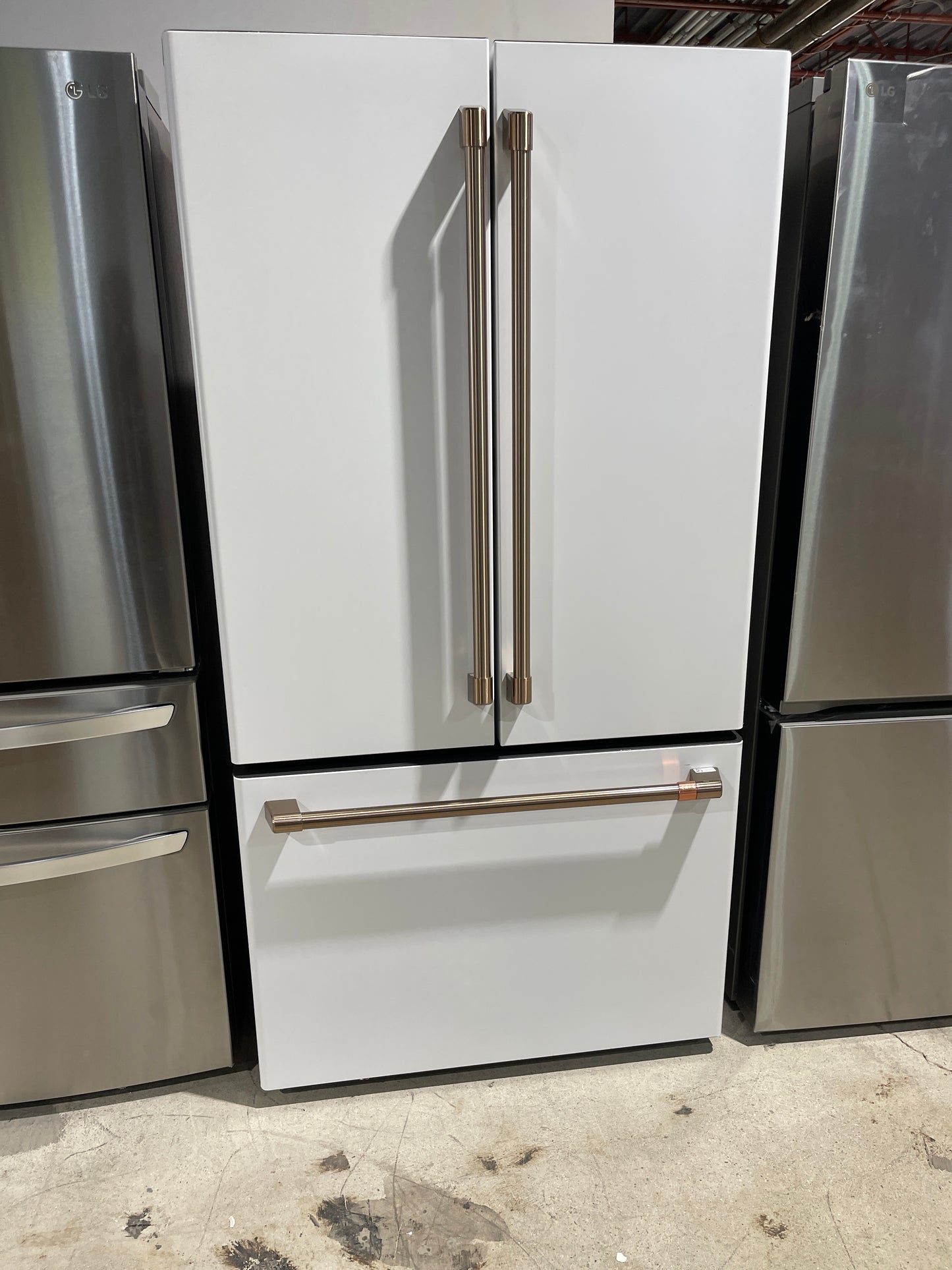 Cafe CWE23SP4MJW2 French Door Refrigerator, 36" Width, ENERGY STAR Certified, Counter Depth, 23.1 cu. ft. Capacity, Freezer Located Ice