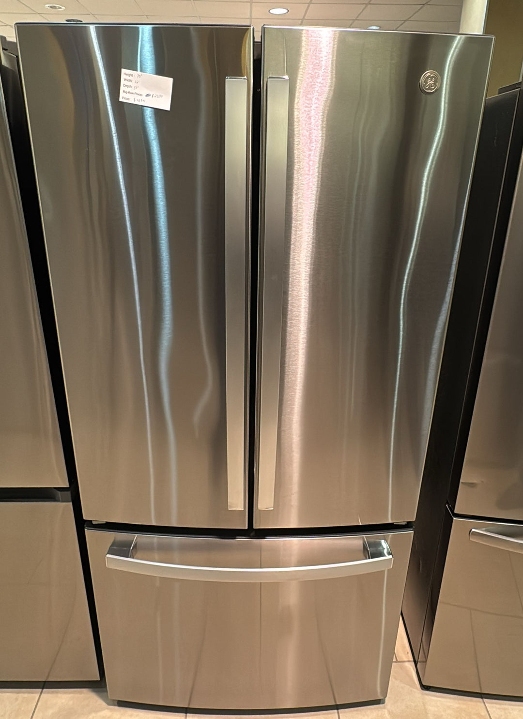 GE GNE25DYRKFS Bottom Freezer French Door Refrigerator, 33 inch Width, 24.8 cu. ft. Capacity, ENERGY STAR Certified, Stainless Steel colour Glass Shelves